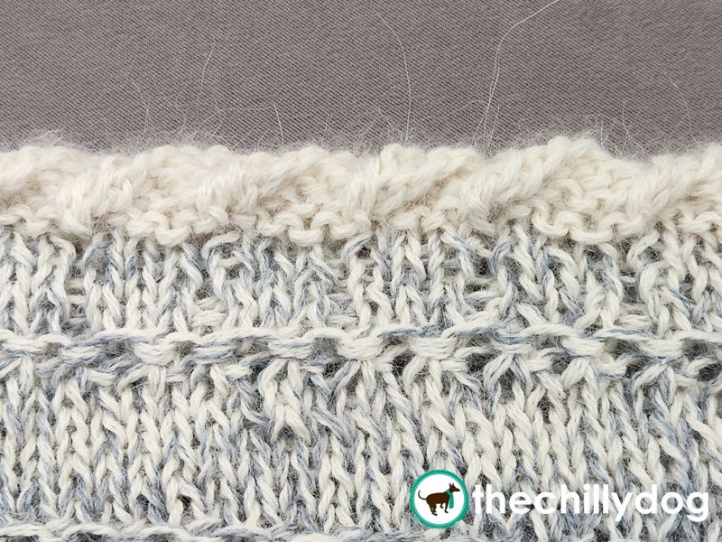 Using a balanced stitch pattern can help prevent cast on edges from curling.