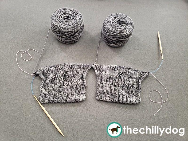 Knitting both sweater sleeves at the same time ensures they are the same size.