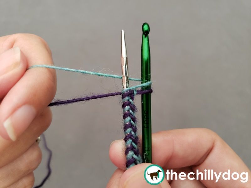 Casting on alternating color stitches for double knitting or colorwork.
