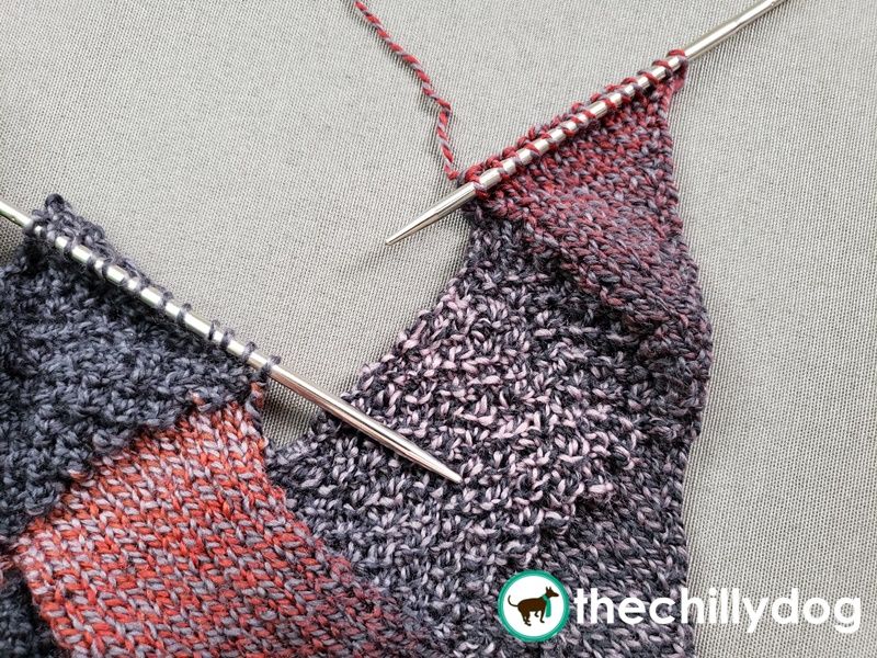 The right hand edge of an entrelac piece is usually edged in stockinette triangles.