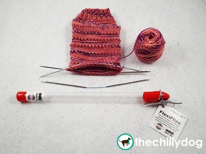 Knitting on flexible, double pointed needles.