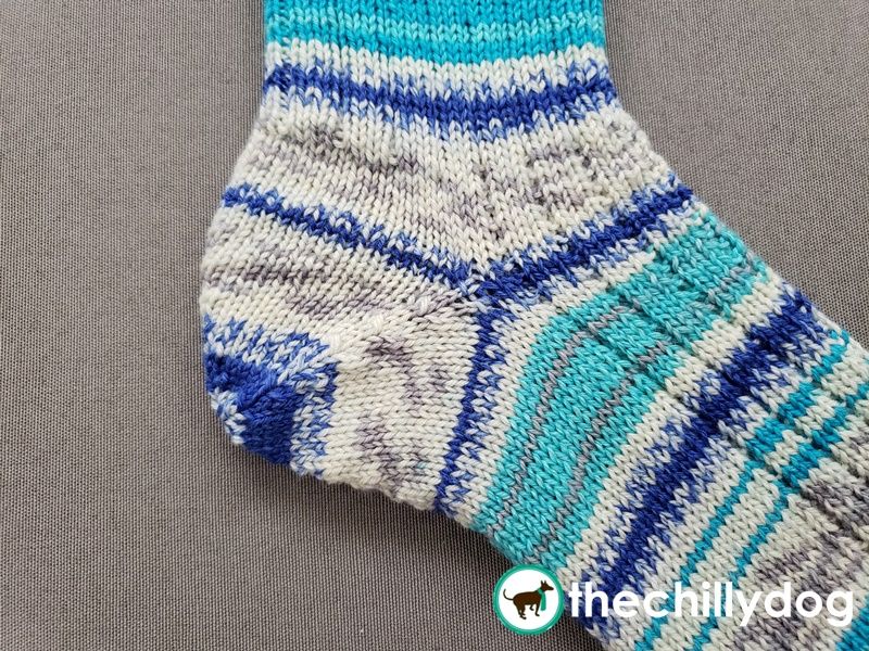 We're finishing our Line Drawing Socks by knitting the heel.