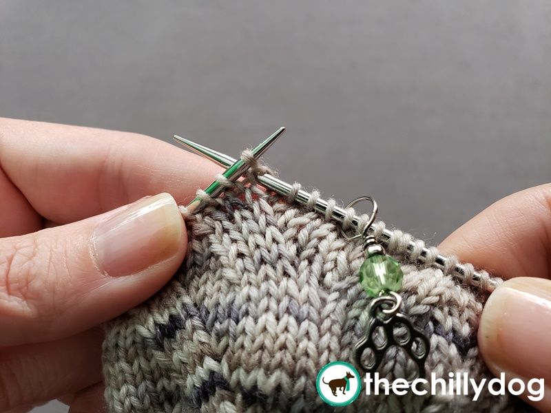 Knitting below a stitch to add a stitch to your fabric.