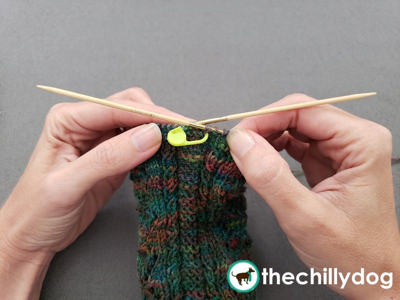 Two locking stitch markers can help you eliminate pesky gaps at the top of a gusset.