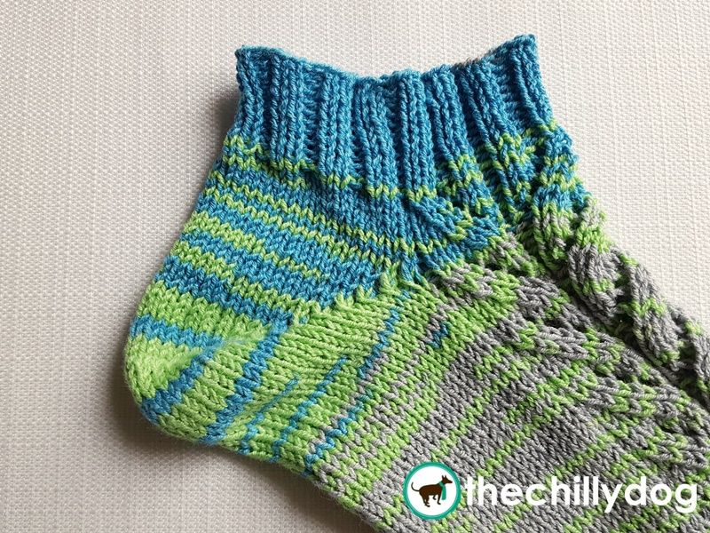 Using the suspended bind off to finish a sock cuff.