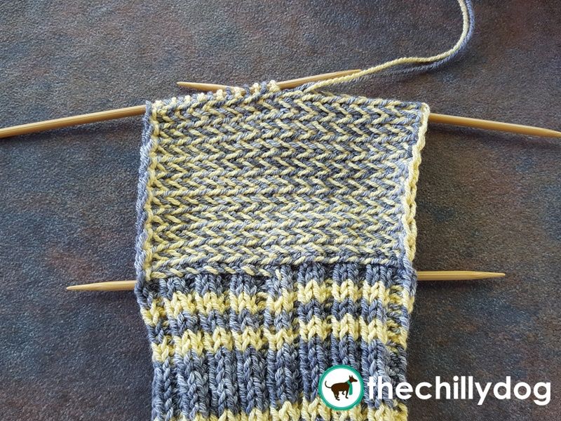 Twisting your yarns around each other while alternating stitch colors.